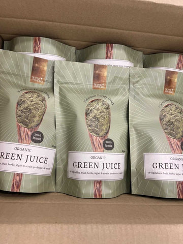 Een doos met gevulde zakken Green Juice