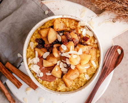 Golden milk oatmeal with steamed cinnamon apples